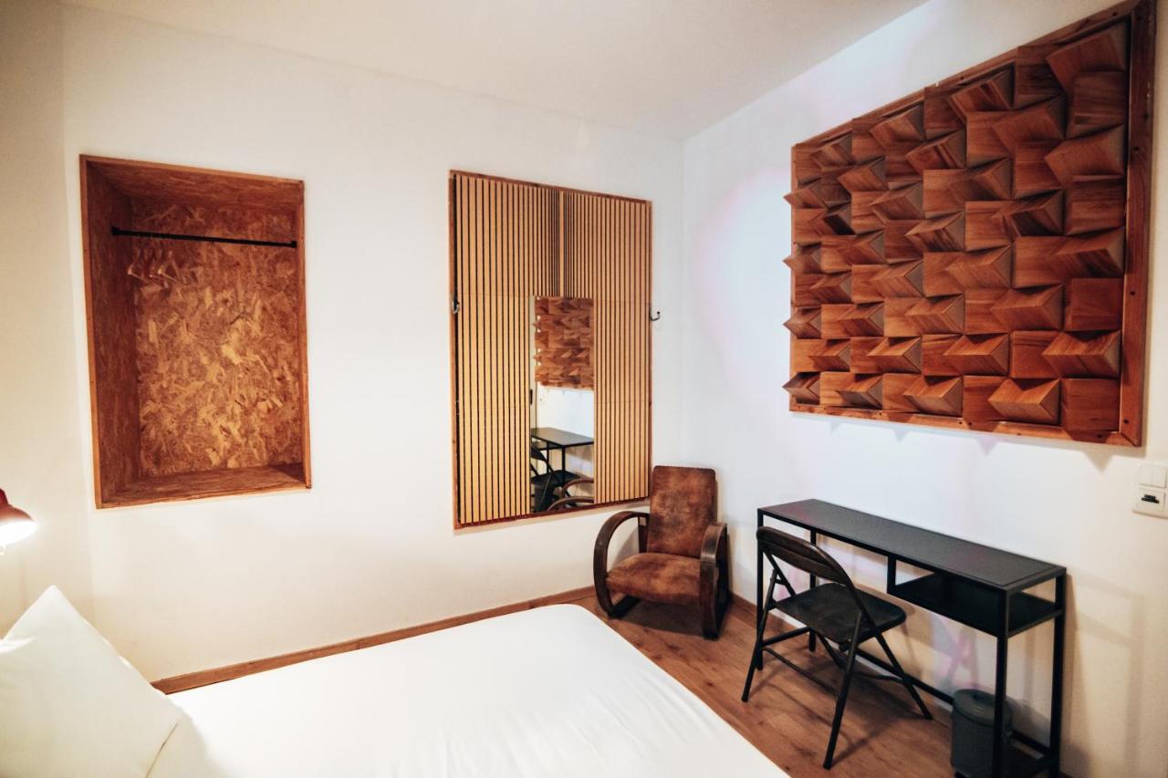 Quarto Duplo com Banheiro Compartilhado