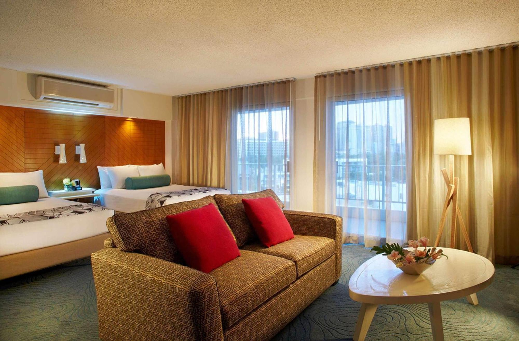 Junior Suite Two Double Beds + Sofa Bed with Kitchenette