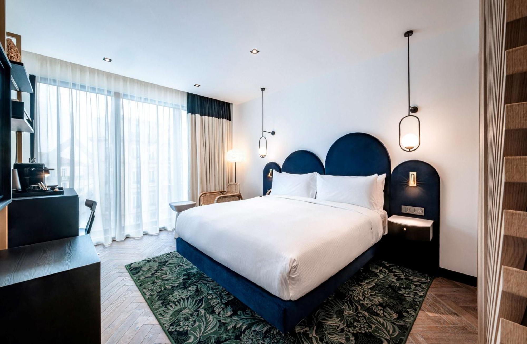 Kamer met Kingsize Bed en Uitzicht op de Stad