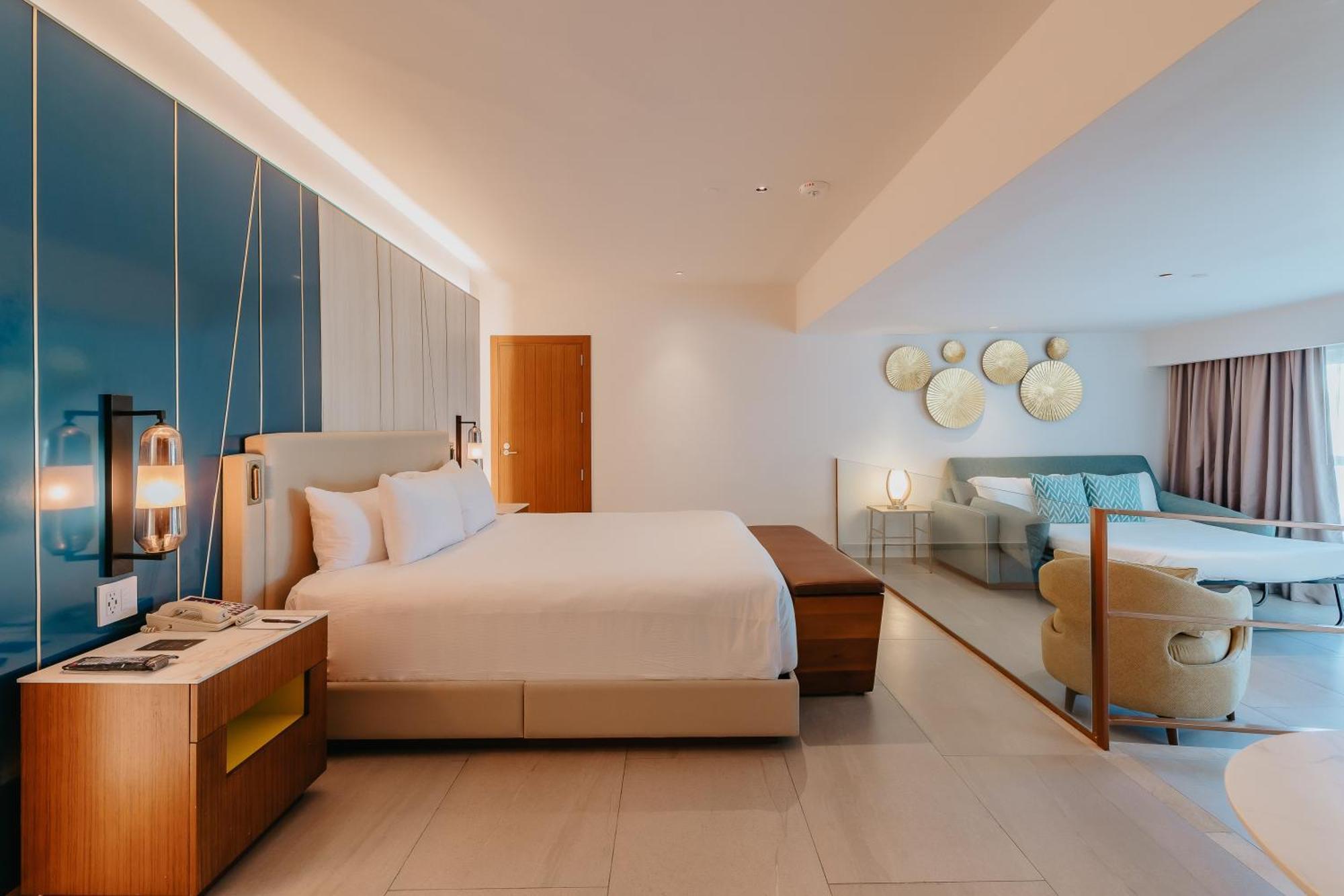Suite Caribbean accessibile con letto king-size e divano-letto