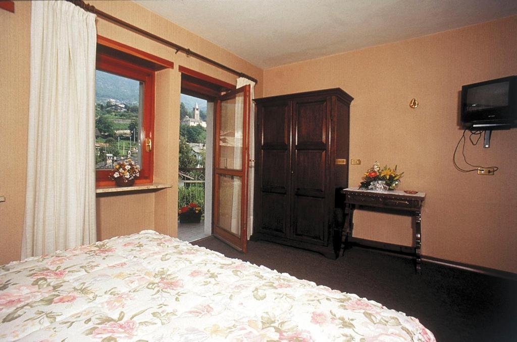 Camera Familiare con Balcone (2 Adulti + 2 Bambini)