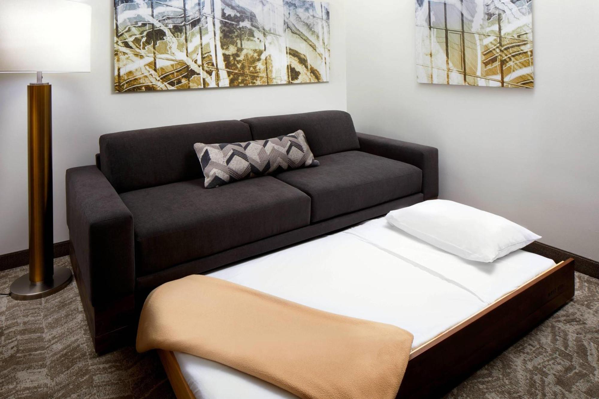 Queen Suite with Two Queen Beds and Sofa Bed