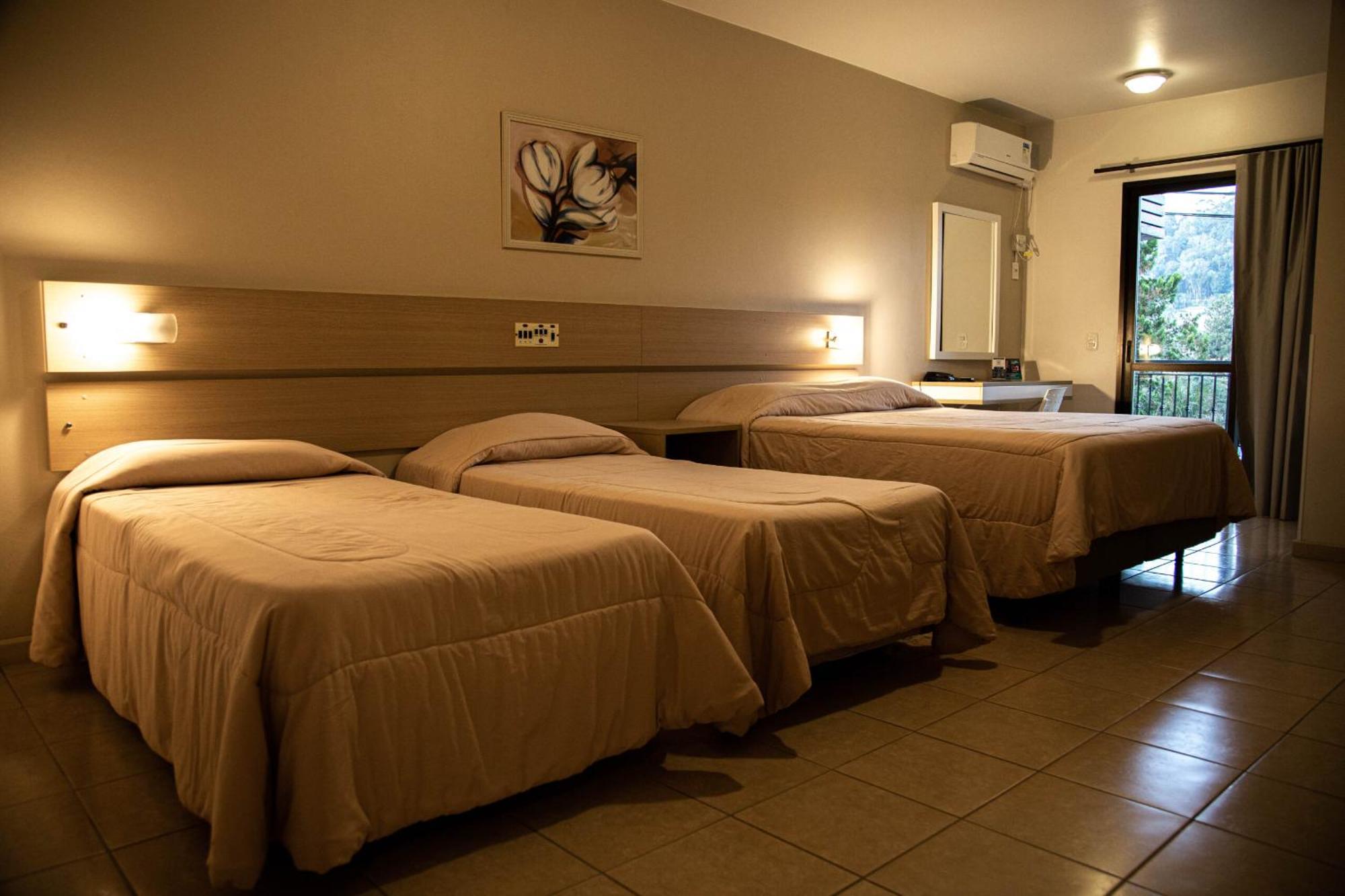 Quarto Triplo Luxo