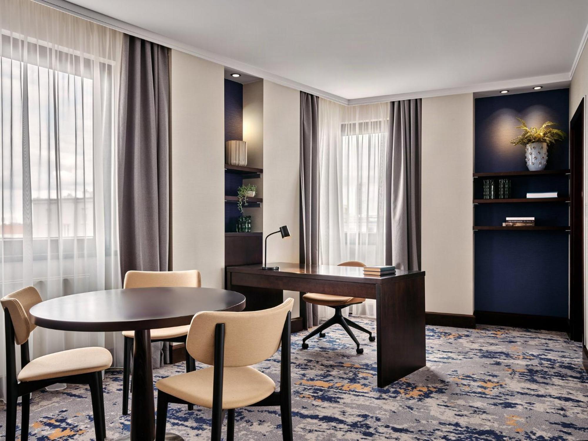 Business Suite with Living and Dining Area