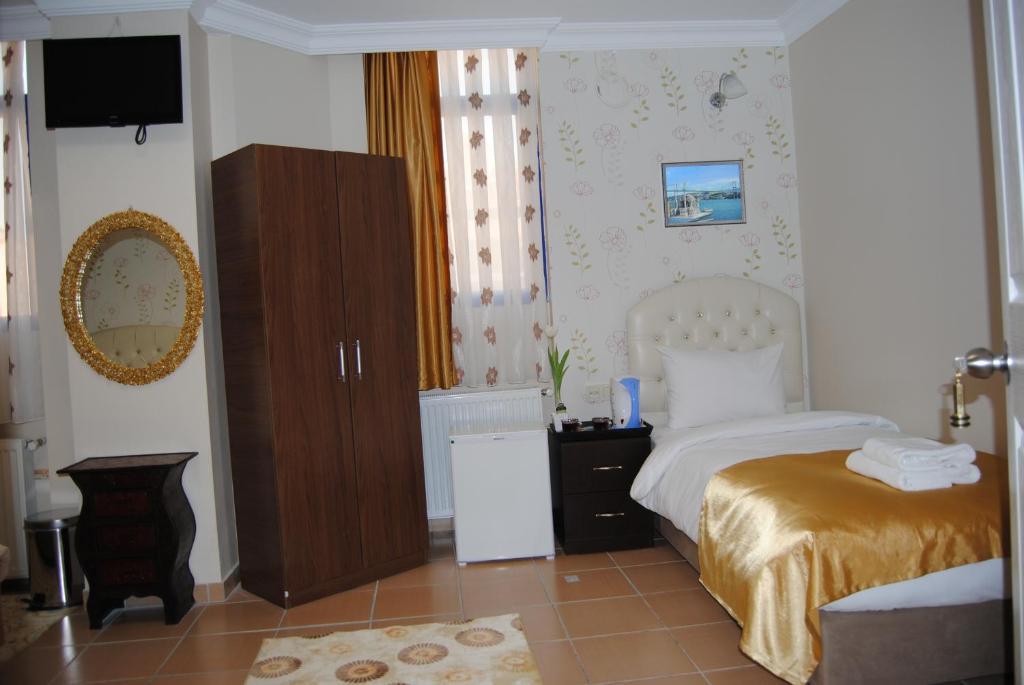 Quarto Família (5 Adultos)
