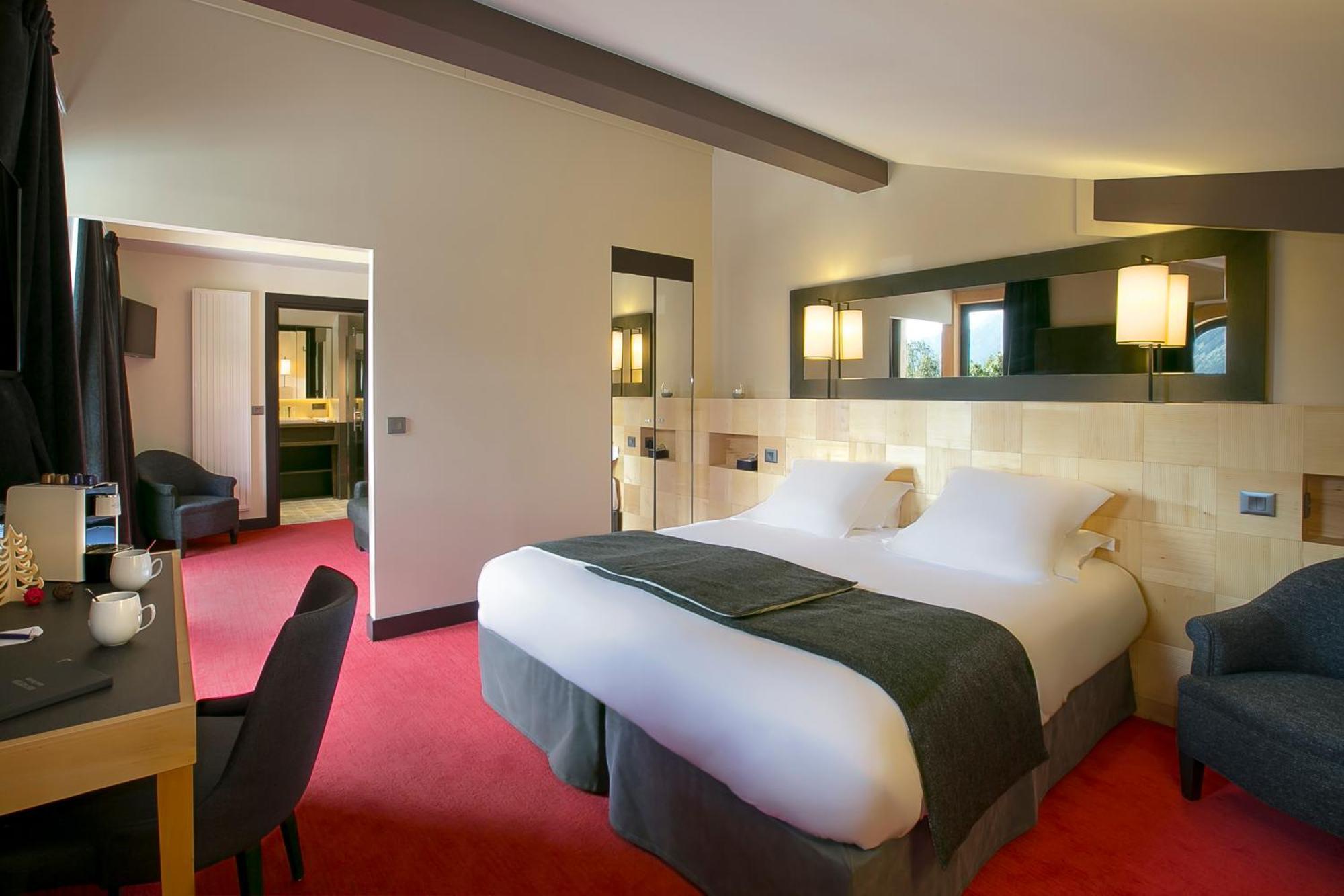 Suite met Queensize Bed en Balkon