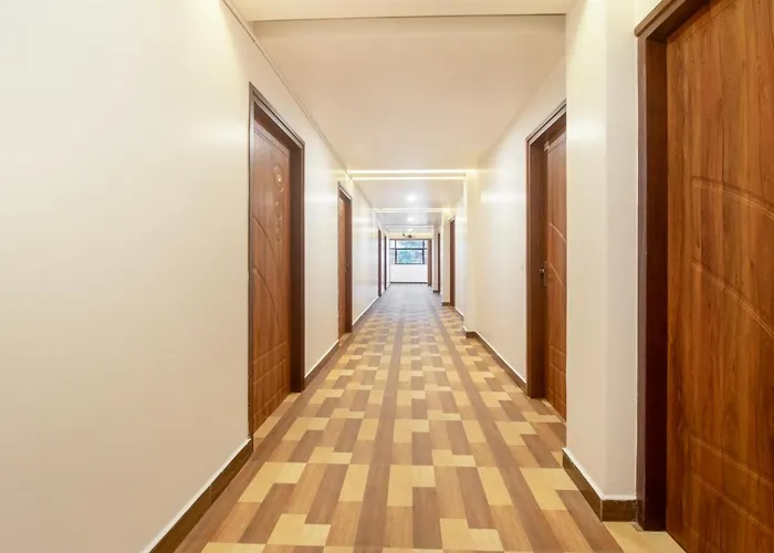 Treebo Elite Plaza, 700 Mtrs From Madikeri Fort