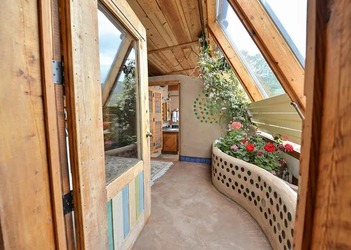 Peaceful Mt Top Earthship Retreat With Sauna & Views