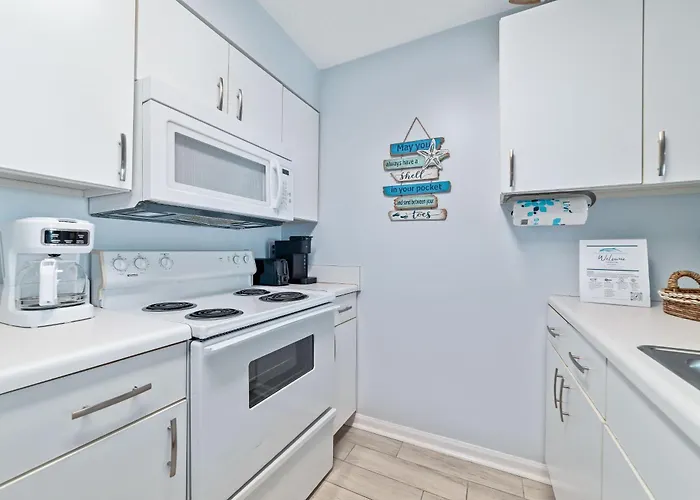 Tradewinds 204-Beachfront-Low Density-Seasonal Heated Pool-Steps To The Beach