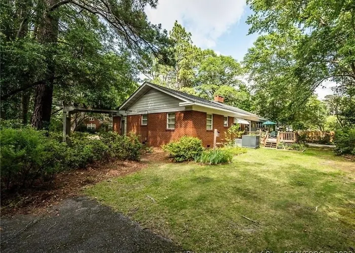 Central Located Large Home On Quiet Wooded Street