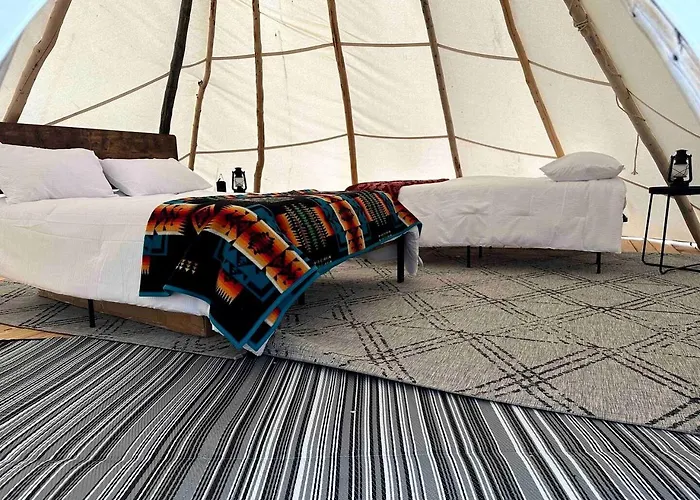 Rustic Elegance: Tipi Glamping By Wind River Mountains In Fort Washakie