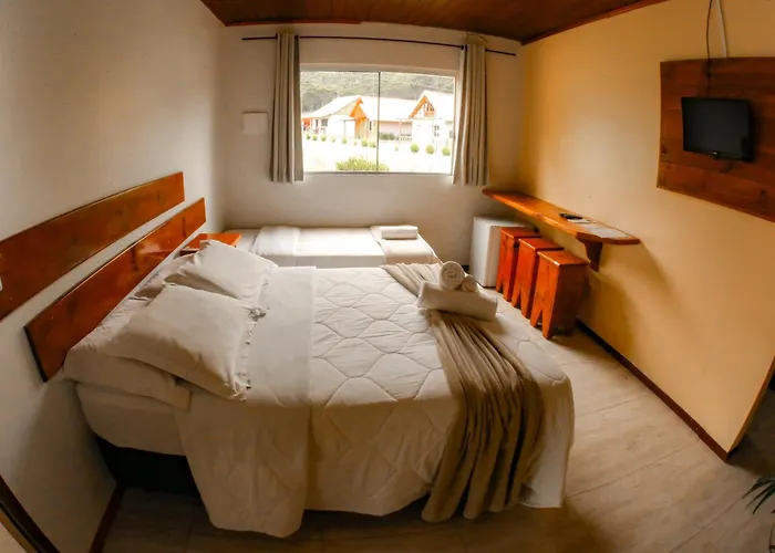 Pousada Rural Pavão - Suites e Chalés