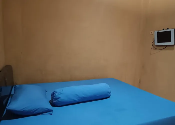 Oyo 93073 Penginapan 69
