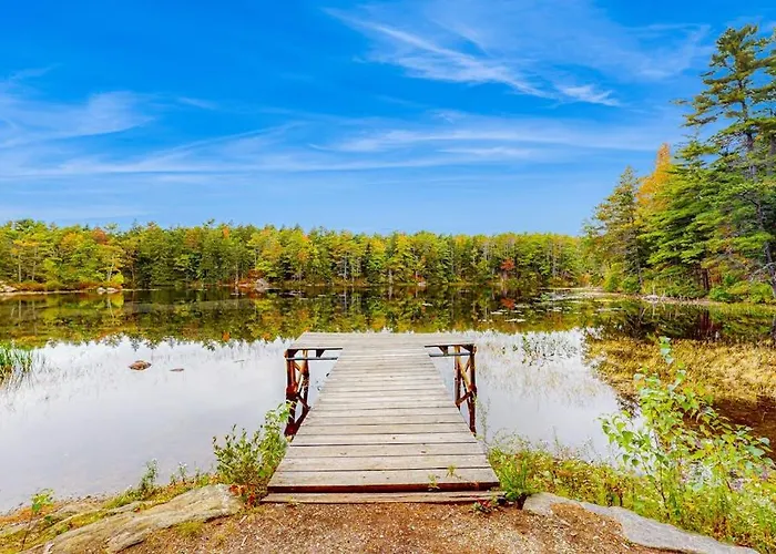 Appalachee Pond Waterfront Cottage | Decks, Sunroom, Dock With Kayaks & Canoe