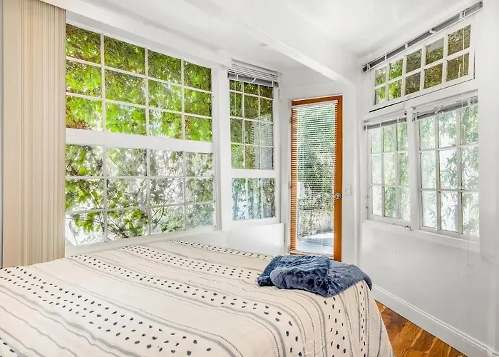 Vine-Covered Garden Suite | Queen + Patio