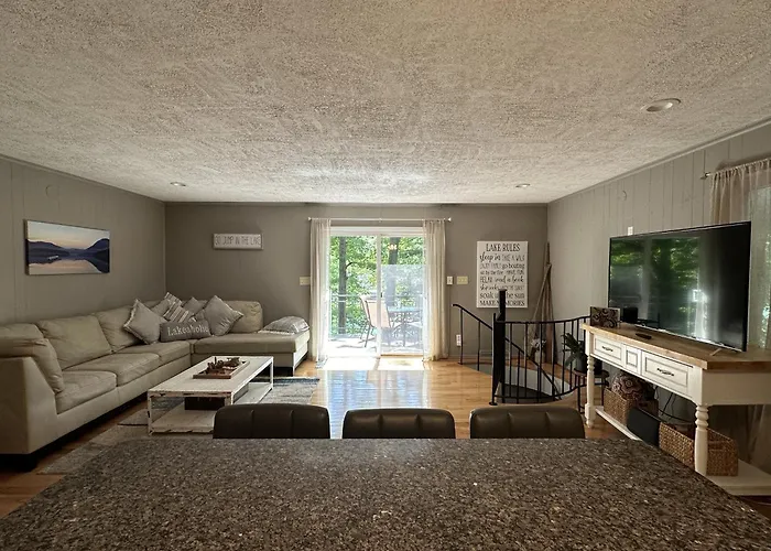 Humble Hideaway - Inviting Lakefront Home With Firepit, Balcony & W/D - Dog-Friendly